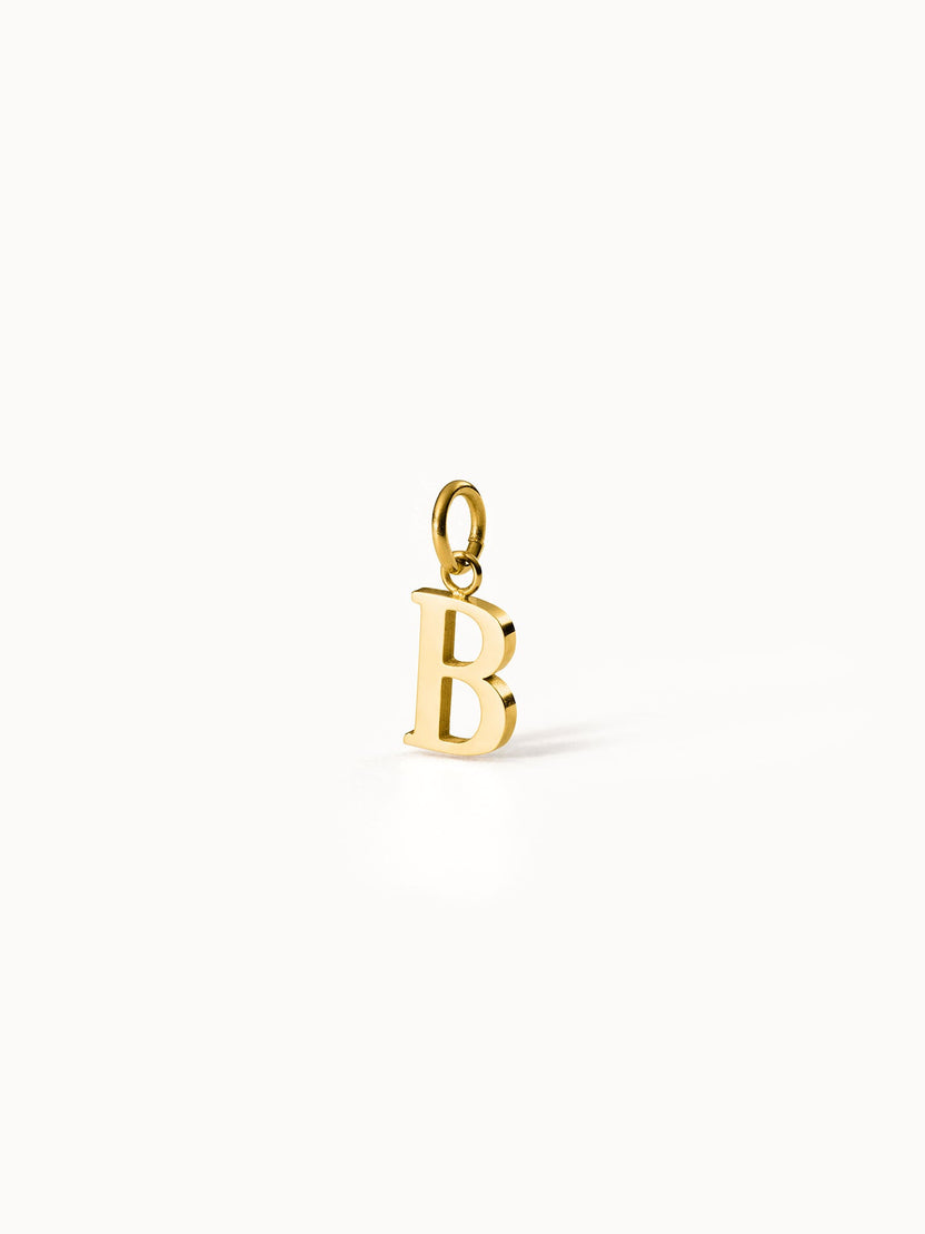 Purelei Pure B Charm, goldener 18K Edelstahl Buchstaben-Anhänger, minimalistisch, elegante Klarheit, strahlend warm.