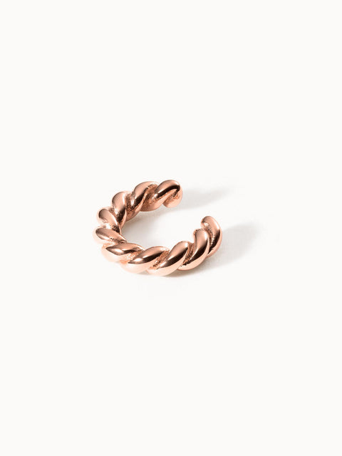 Roségoldenes, gewundenes Ring-Design von PURELEI, elegant und modern.