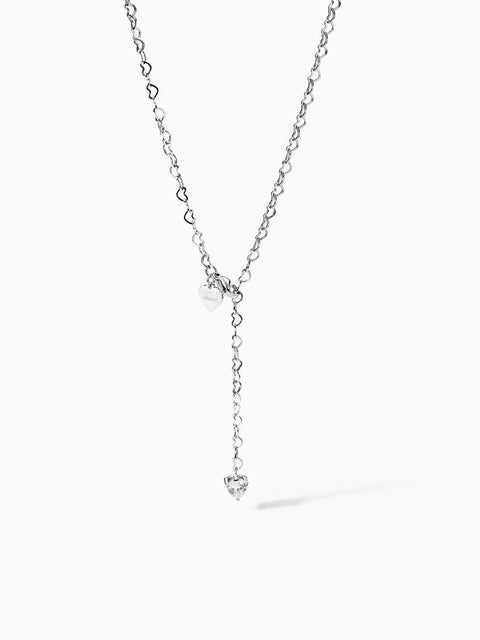 Silberne Kette mit Herzanhängern von PURELEI, elegant und verspielt.