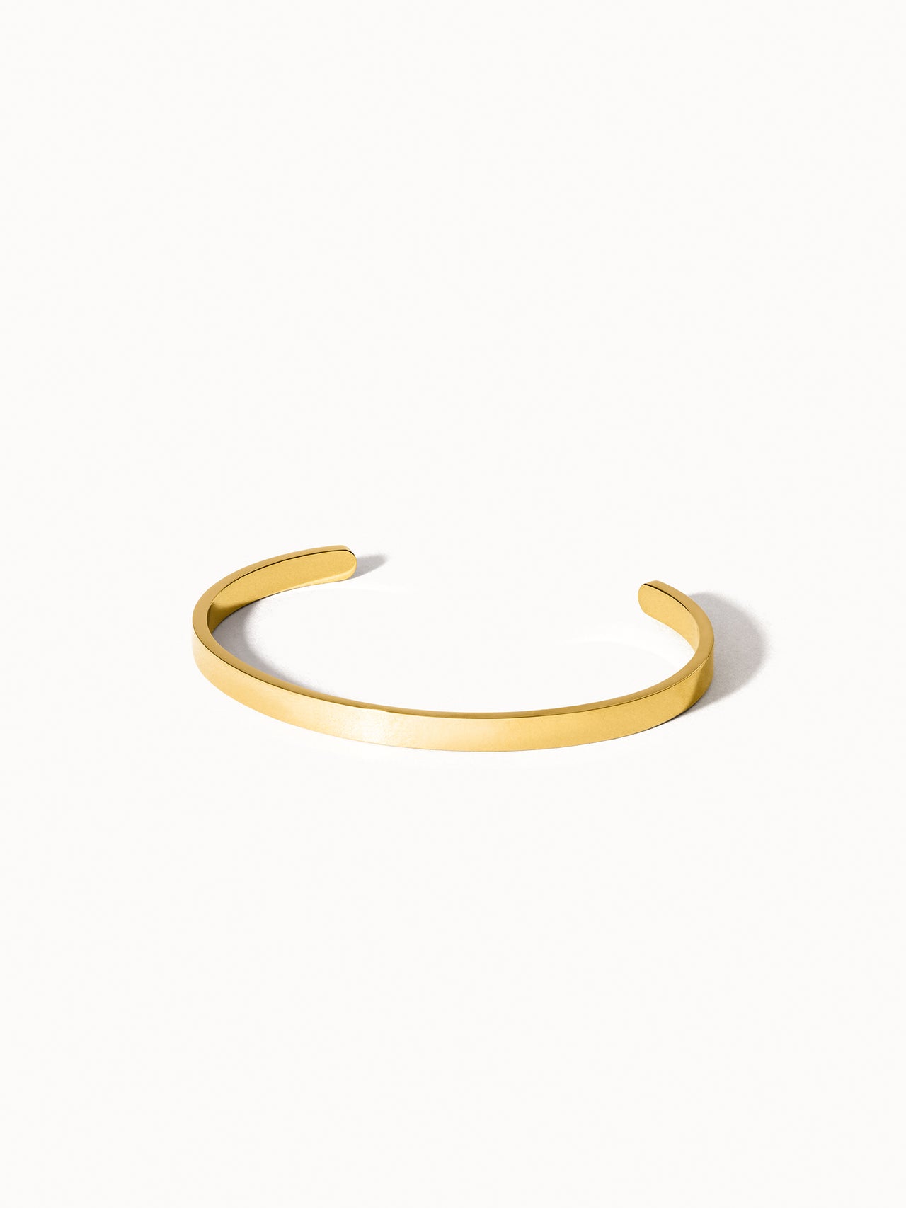 PURELEI Connection Armcuff aus goldfarbenem, nickelfreiem Metall, minimalistisch und elegant gestaltet, clean & edel.