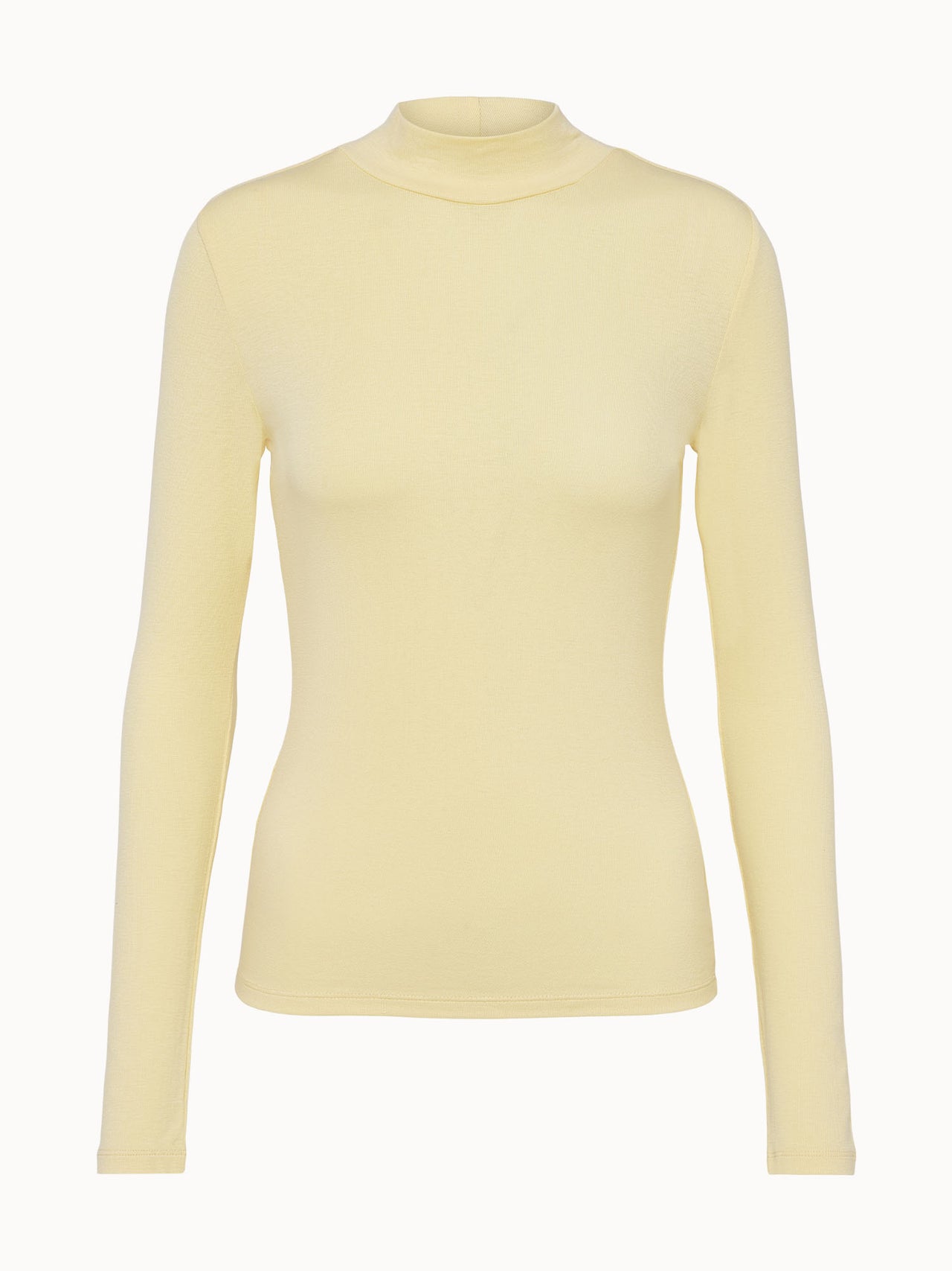 Leichtes, gelbes Langarmshirt mit hohem Kragen von PURELEI, elegant und feminin.