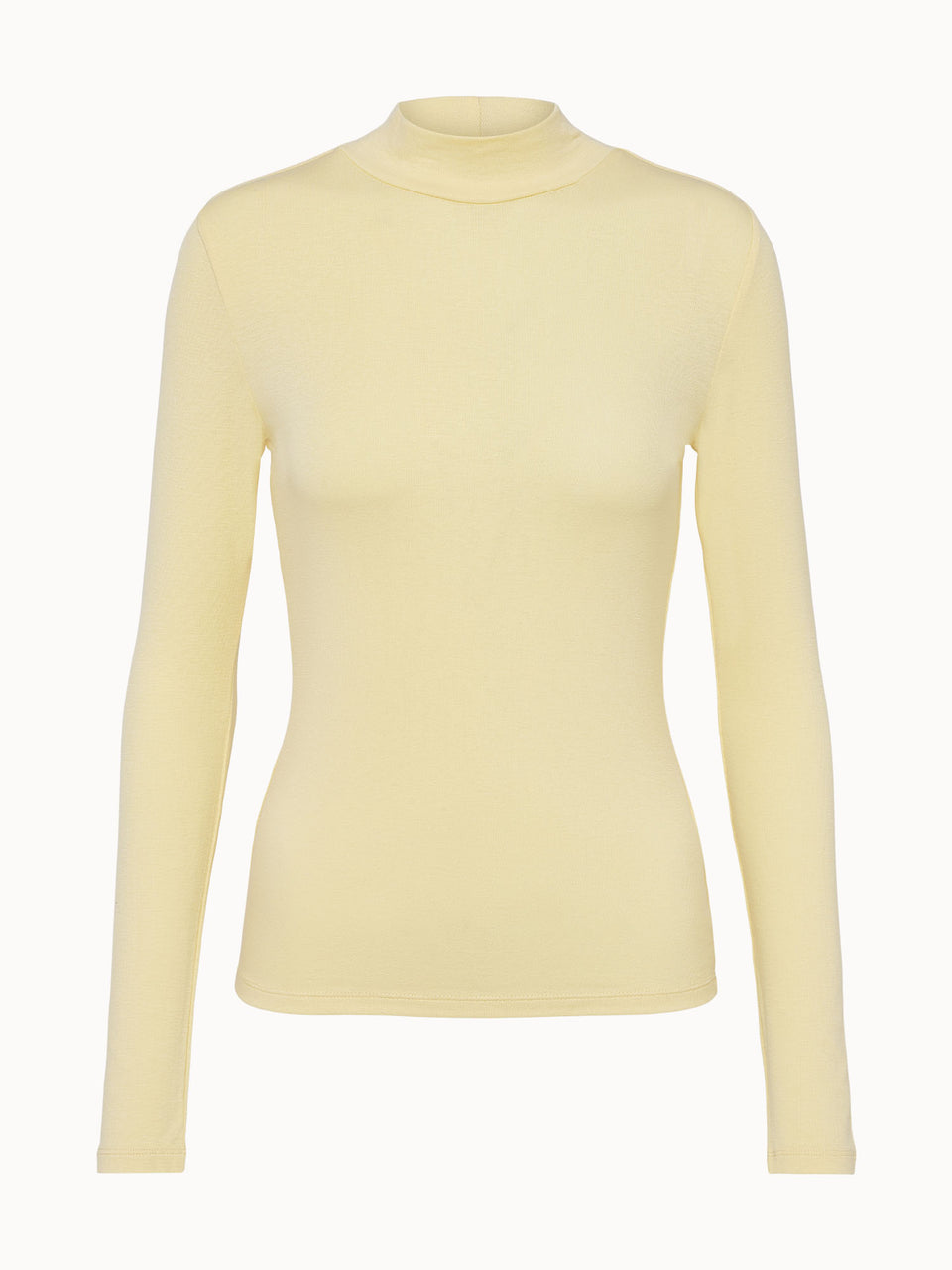 Leichtes, gelbes Langarmshirt mit hohem Kragen von PURELEI, elegant und feminin.