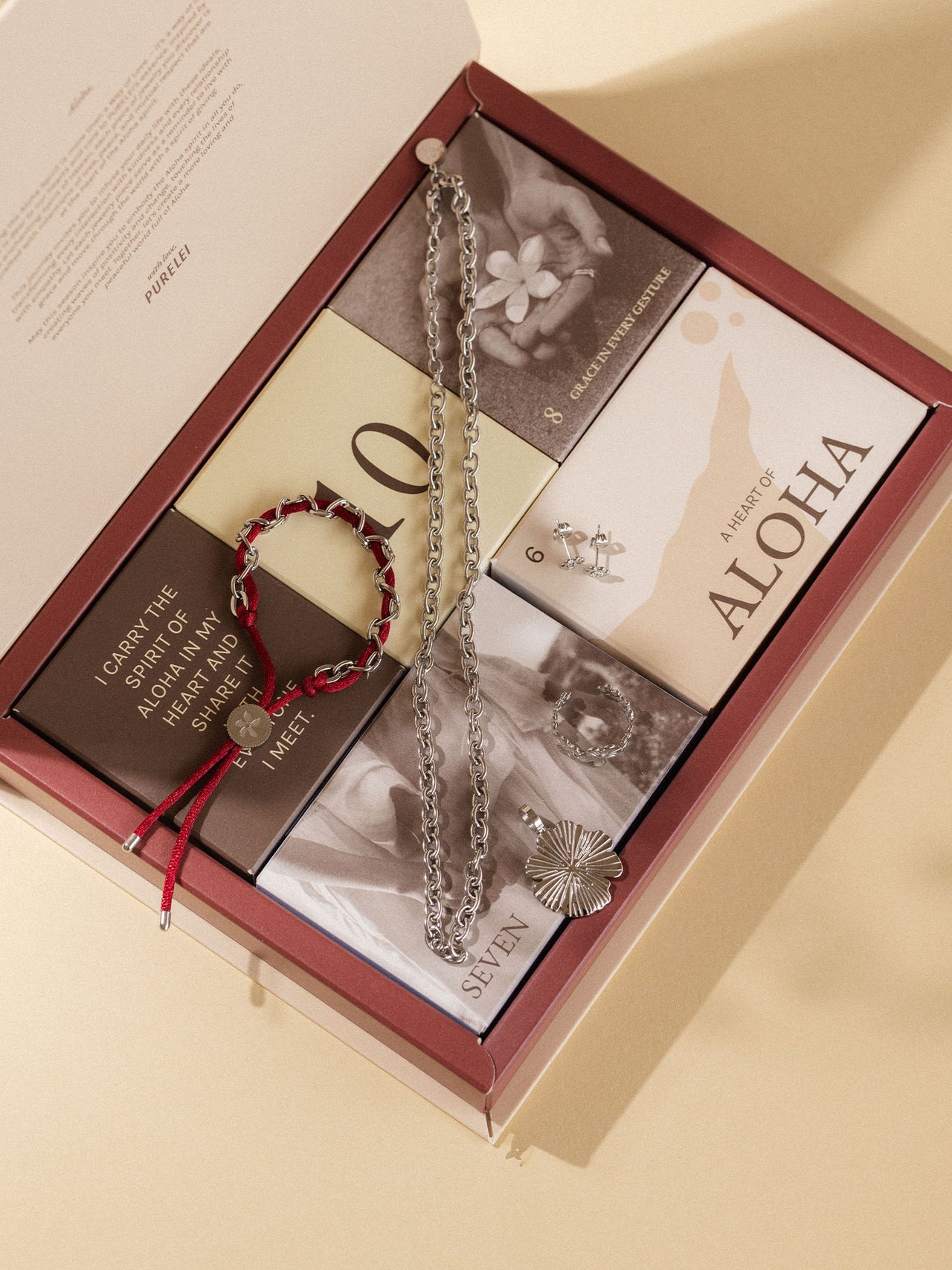 Silberne Kette und Armband in PURELEI Geschenkbox, elegant und inspirierend.