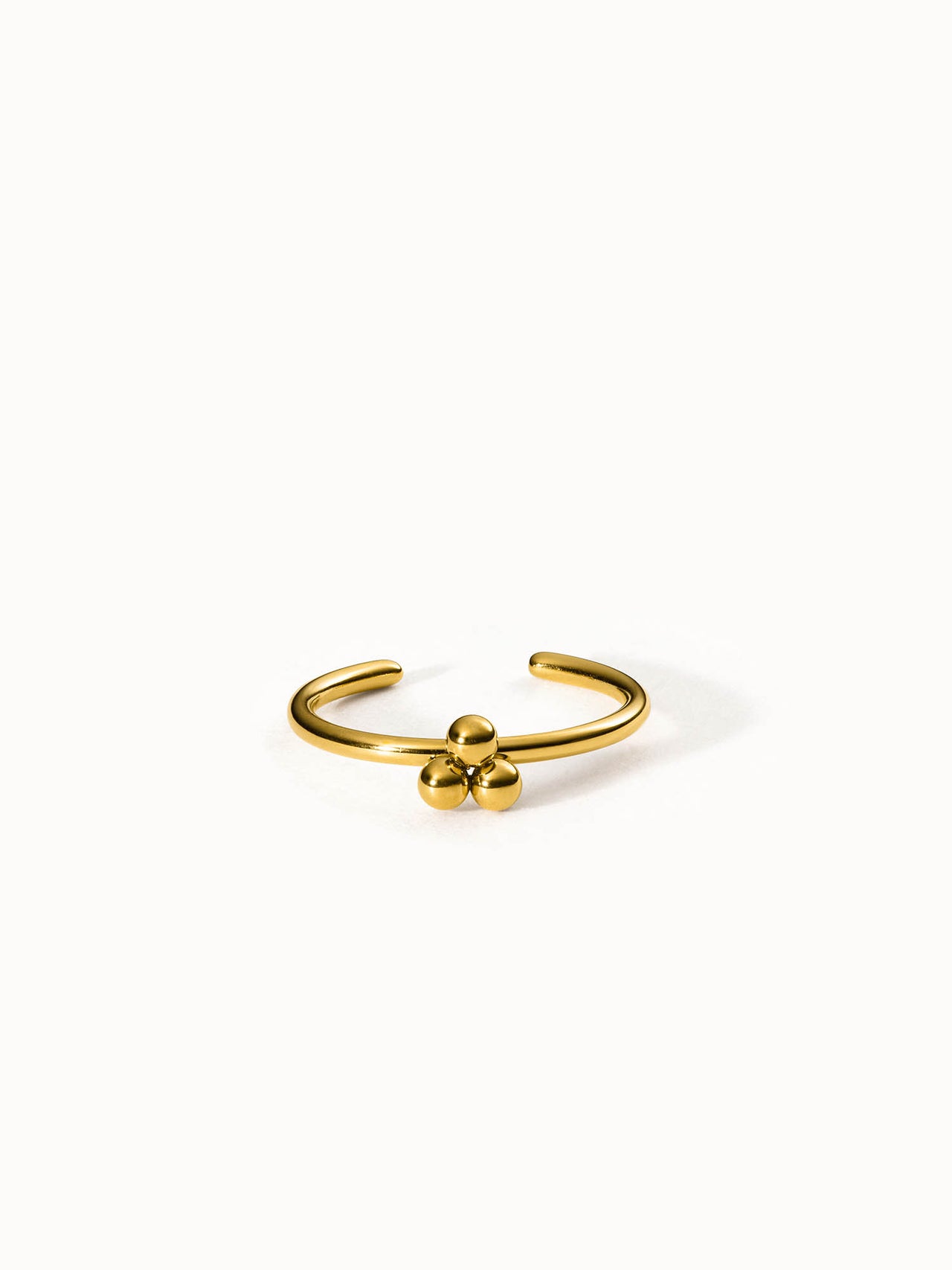 Goldener Ring mit drei Kugeldetails von PURELEI, elegant und modern.