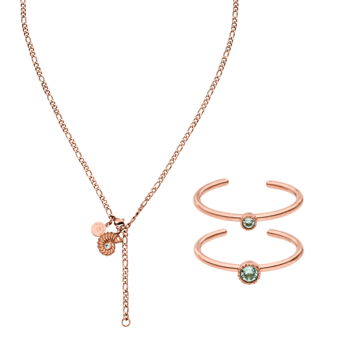 Roségoldene Kette und Armreifen mit glitzernden Steinen von PURELEI, elegant und feminin.